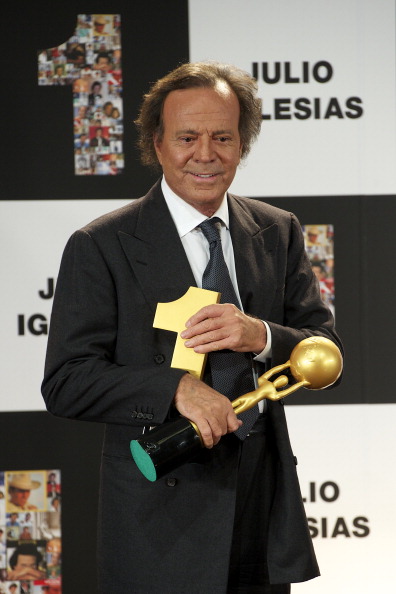 MADRID, SPAIN - DECEMBER 16: Spanish singer Julio Iglesias receives the Award for artist who has sold the most records in Spain and Latino Artist Award for the most albums sold in the world at Cervantes Instittute on December 16, 2011 in Madrid, Spain. (Photo by Carlos Alvarez/Getty Images)